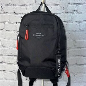 Sherpani Black Backpack with Red Zippers